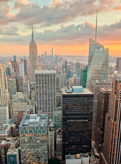 Вид на Мидтаун из ресторана, расположенного под смотровой площадкой Top of the rock, до и после заката