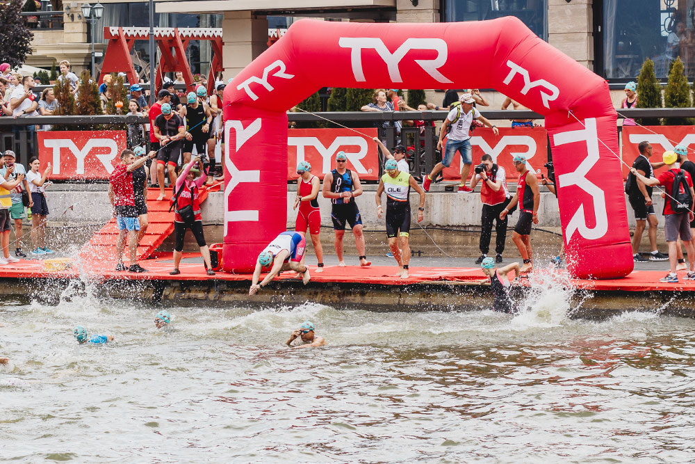 Во время первого старта мужа в Казани в 2018 году температура воды была выше 25 °C, и гидрокостюмы были запрещены